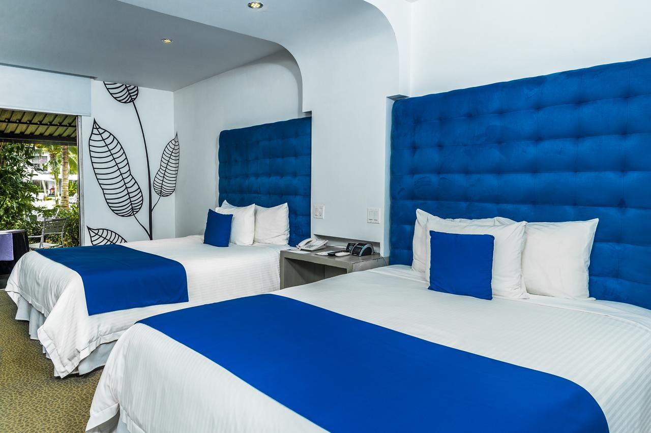 Riande Aeropuerto Hotel Casino Токумен Экстерьер фото